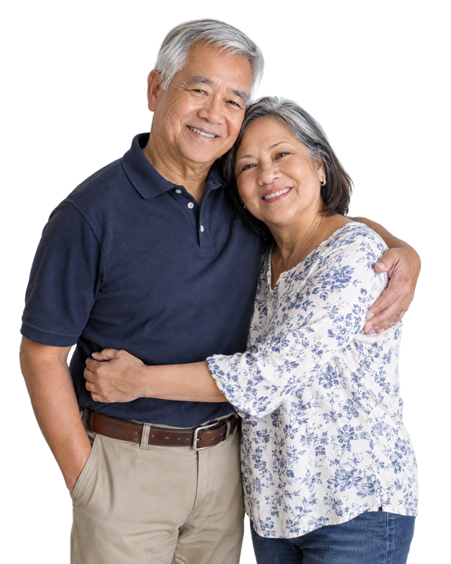 A relaxed, happy retired couple embracing at home