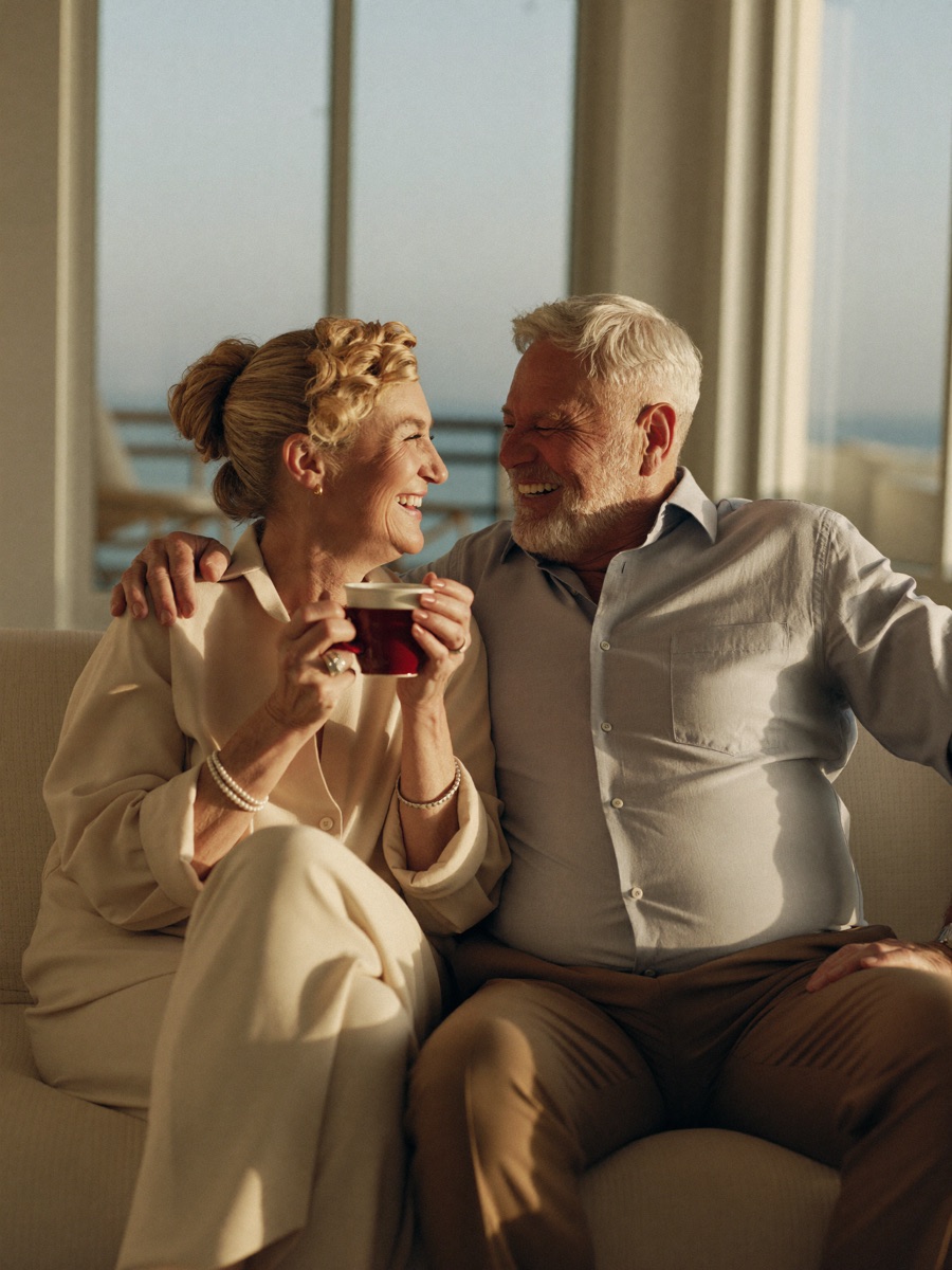 A retired couple, relaxed and happy together